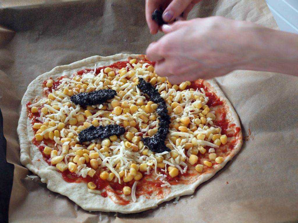 Watch Pizza before going into the oven.